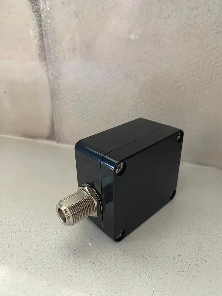 The completed tiny junction-box node with its N-Type antenna connector