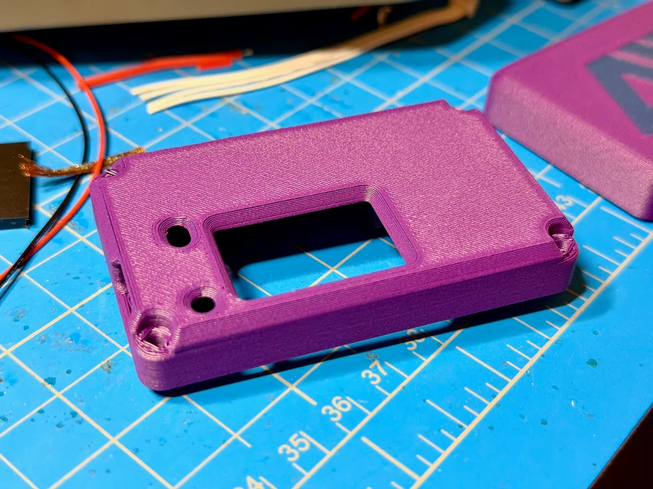Purple case front before assembly
